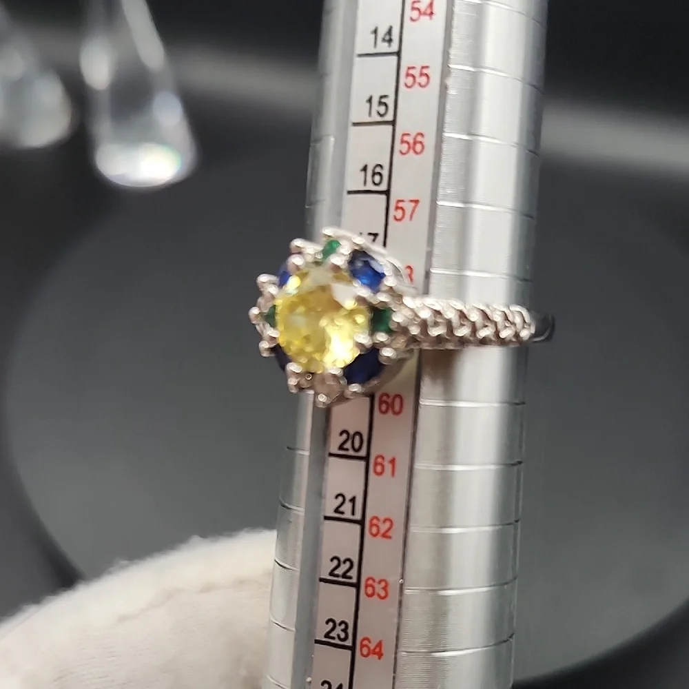 Elegant Silver Ring with Yellow and Blue Stones